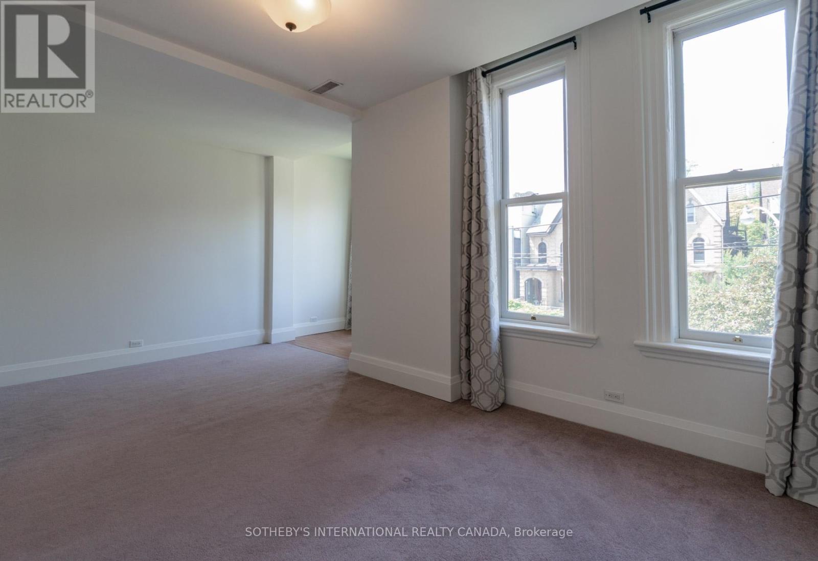 Unit 2 - 215-217 Carlton Street, Toronto, Ontario  M5A 2K9 - Photo 12 - C12405242