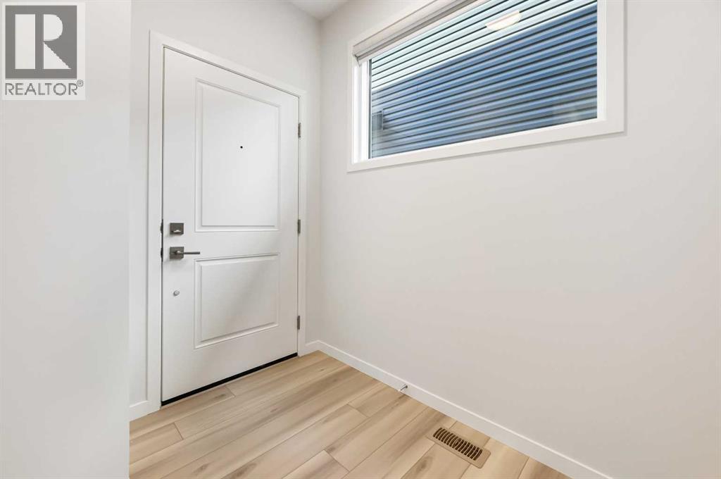 232 Belmont Park Sw, Calgary, Alberta  T2X 5T7 - Photo 4 - A2251792