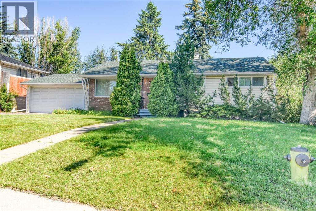 1140 Trafford Drive Nw, Calgary, Alberta  T2K 2T8 - Photo 2 - A2244240