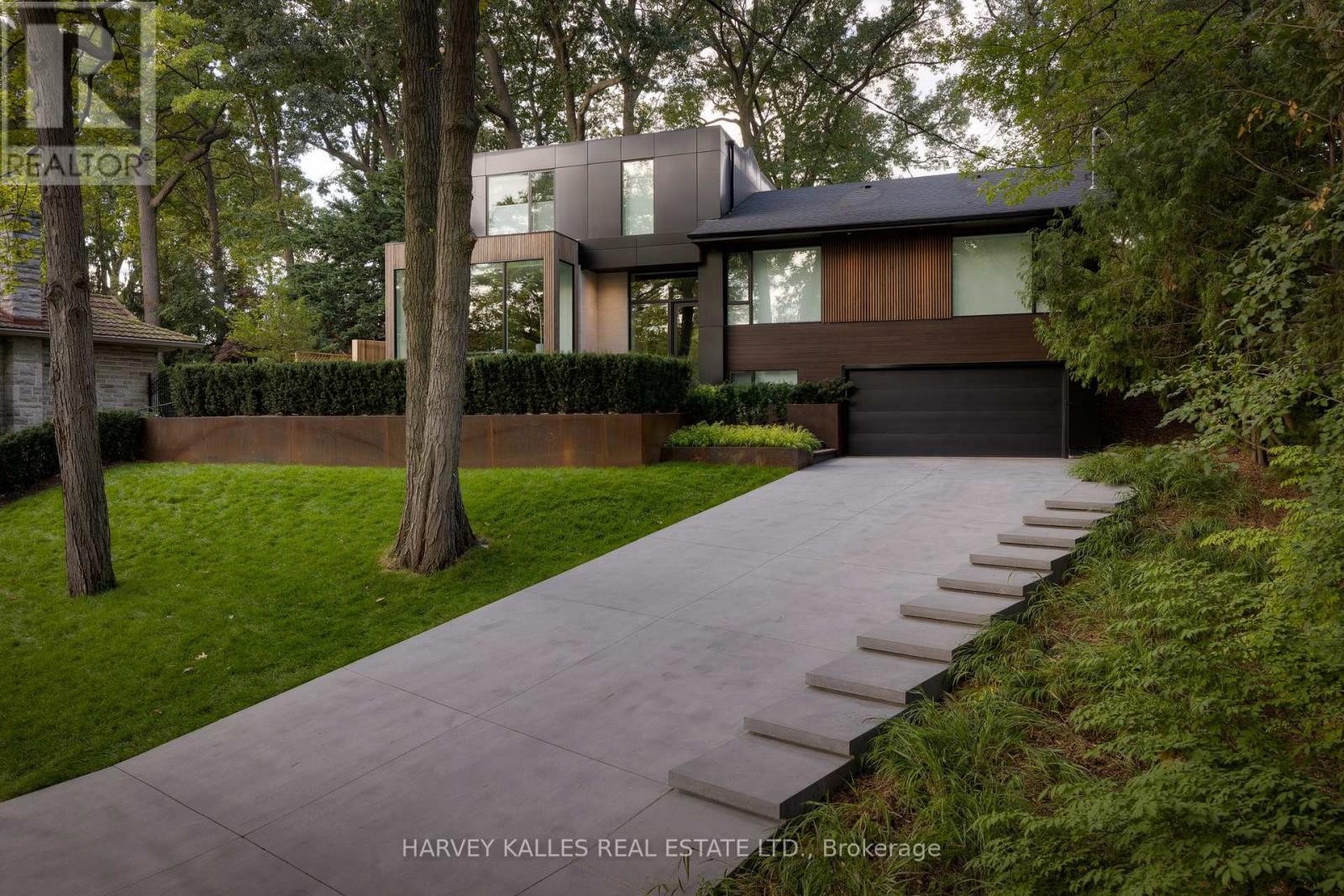 Breathtakingly Modern Home in the Heart of Prestigious Edenbridge-Humber Valley, Located on One of the Best Streets in the Neighbourhood, Backing Onto St. George's Golf Course, Architectural Tour De Force w/ Quality Features and Finishes Thruout, Spacious 3+1 Bdrm, 3 Bath (w/ Heated Flrs), w/White Oak Eng. Hrdwd Thruout, Floor-to-Ceiling PELLA Windows, Premium Gaggenau Appliances, Quartz Countertops, Custom Cabinetry, Home Automation + 3 Independent Climate Zones, Heated Drive & Steps, Private Exterior Shaded by Mature Serbian Pine Trees. Reach Out to Learn More About this Rare Home. (id:48254)