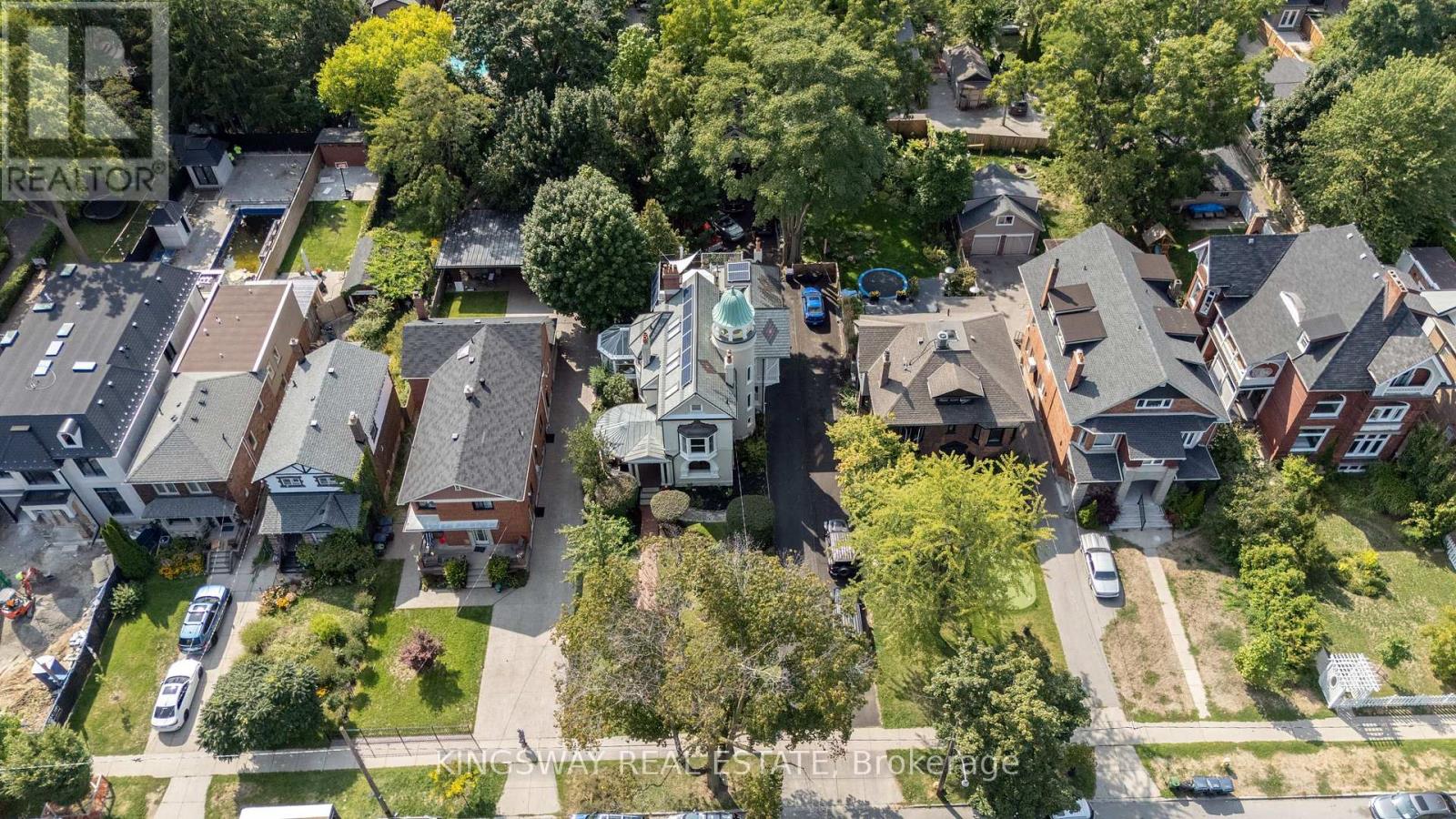 We are saying good-bye to 166 High Park Avenue. The stunning 1891 home of the Heintzman piano makers featured in the book Old Toronto Houses. This residence is now fully restored to surpass its former glory. With carved oak trims, exotic kitchen granite, luxury marble washrooms, slate/solar roof, 360 tower, copper troughs, decks, rare stained-glass windows, chandeliers, 7 fireplaces, solarium, theatre, bar, gym, wine cellar and heated herringbone hardwood floors, its 7-car parking & coach house sit on a 60 X 200  forested lot. Top floor features one of a kind nanny suite with a private entrance and spacious deck. Walking distance to subway station, High Park and Bloor West Village to enjoy all the entertainment and fine dining.  Coach House is fully equipped with an alley kitchen and one 3pc bathroom. (id:48254)