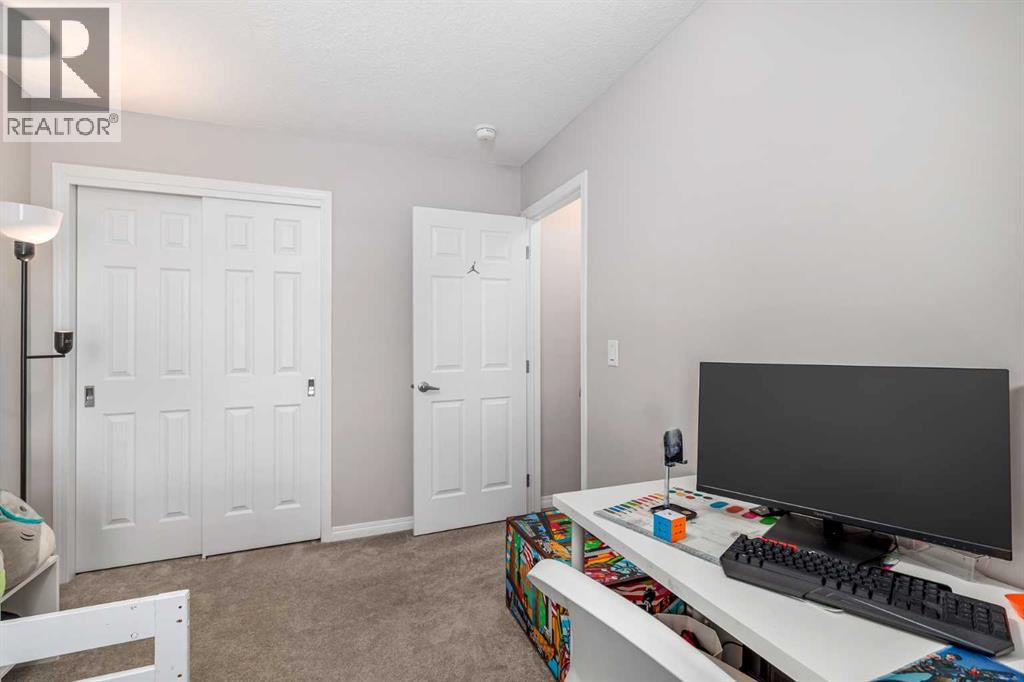 203 Windford Crescent Sw, Airdrie, Alberta  T4B 5E5 - Photo 26 - A2252733