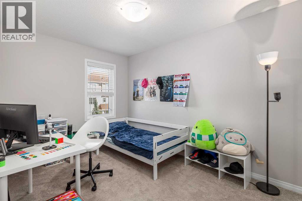 203 Windford Crescent Sw, Airdrie, Alberta  T4B 5E5 - Photo 25 - A2252733