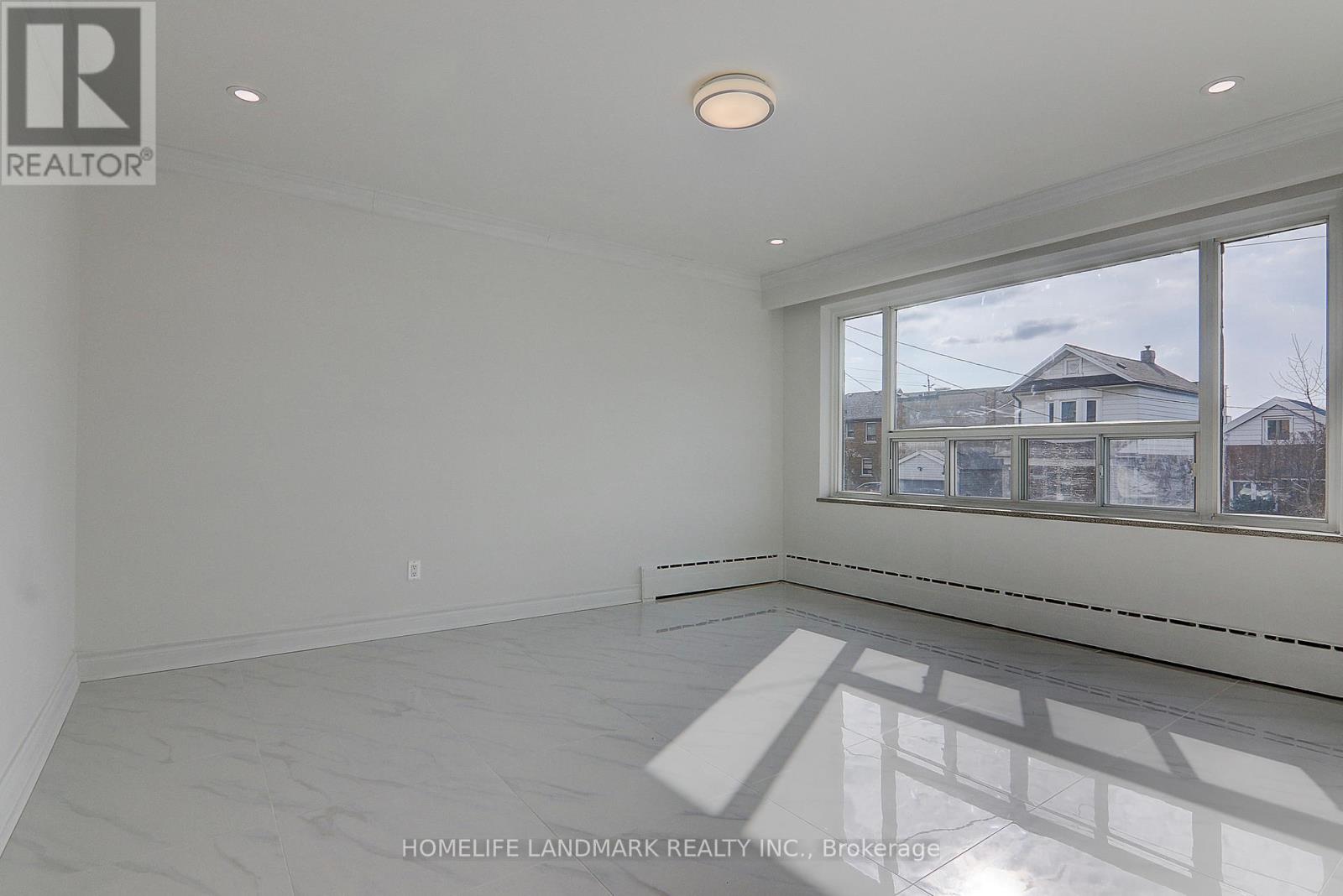 2(Upper - 8 Hanson Road, Toronto, Ontario  M6E 1T3 - Photo 3 - C12405544