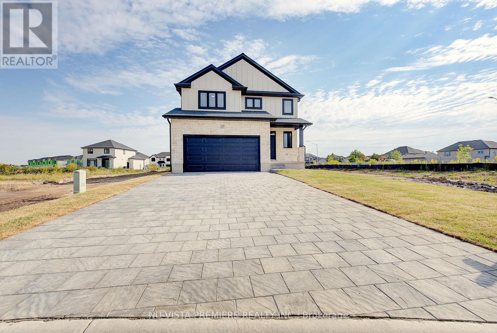 157 Holloway Trail, Middlesex Centre, Ontario  N0M 2A0 - Photo 2 - X12346103