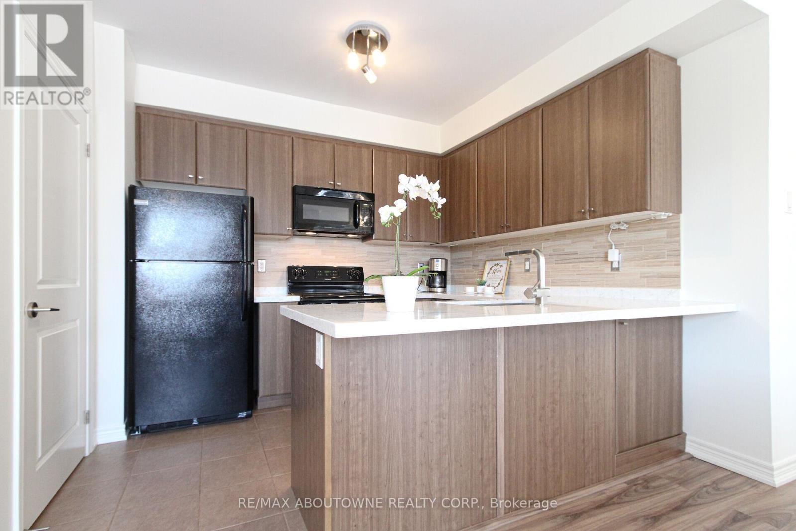 206 - 2339 Sawgrass Drive, Oakville, Ontario  L6H 0L1 - Photo 6 - W12406207
