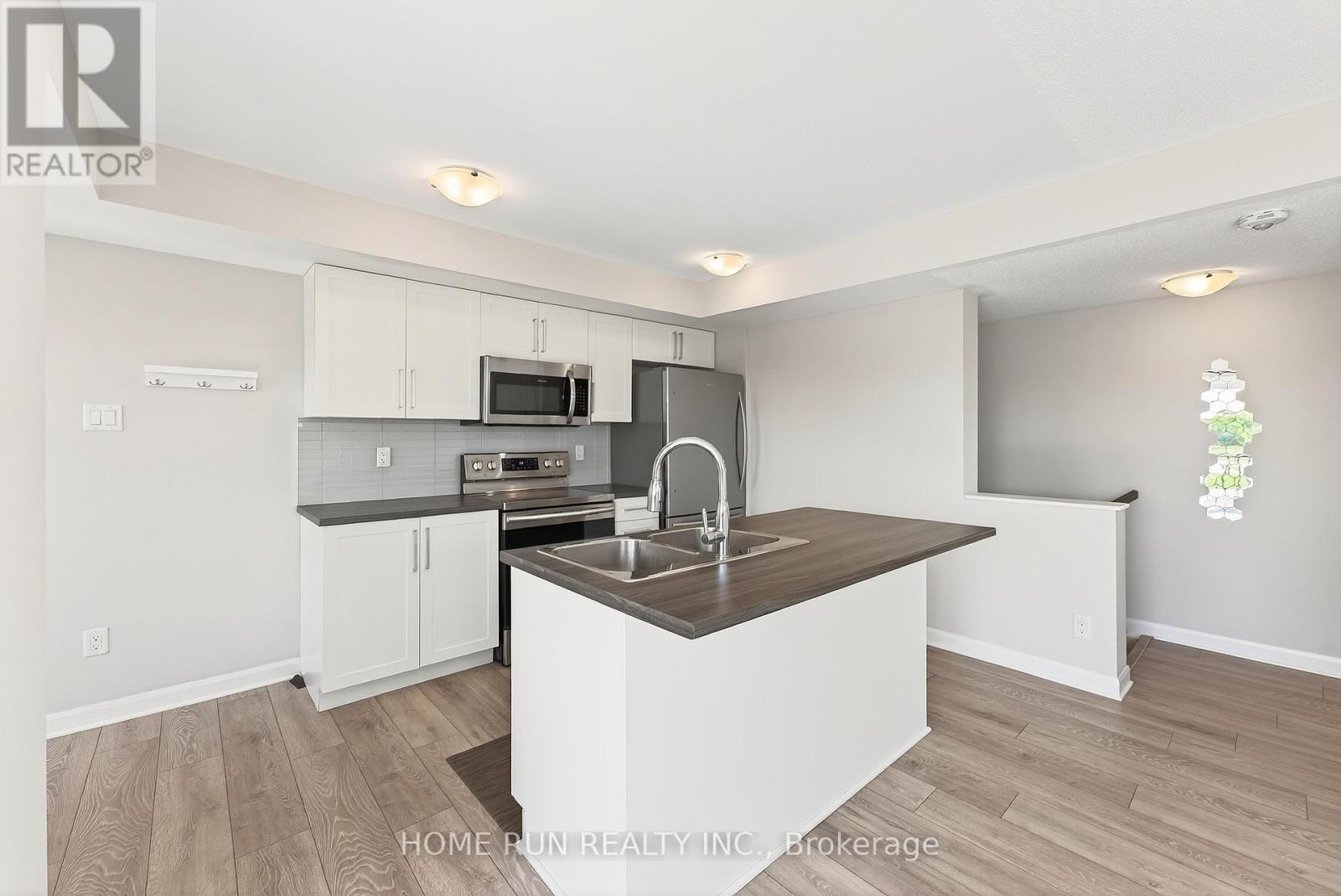 1201 Chapman Mills Drive, Ottawa, Ontario  K2J 6R5 - Photo 5 - X12388328