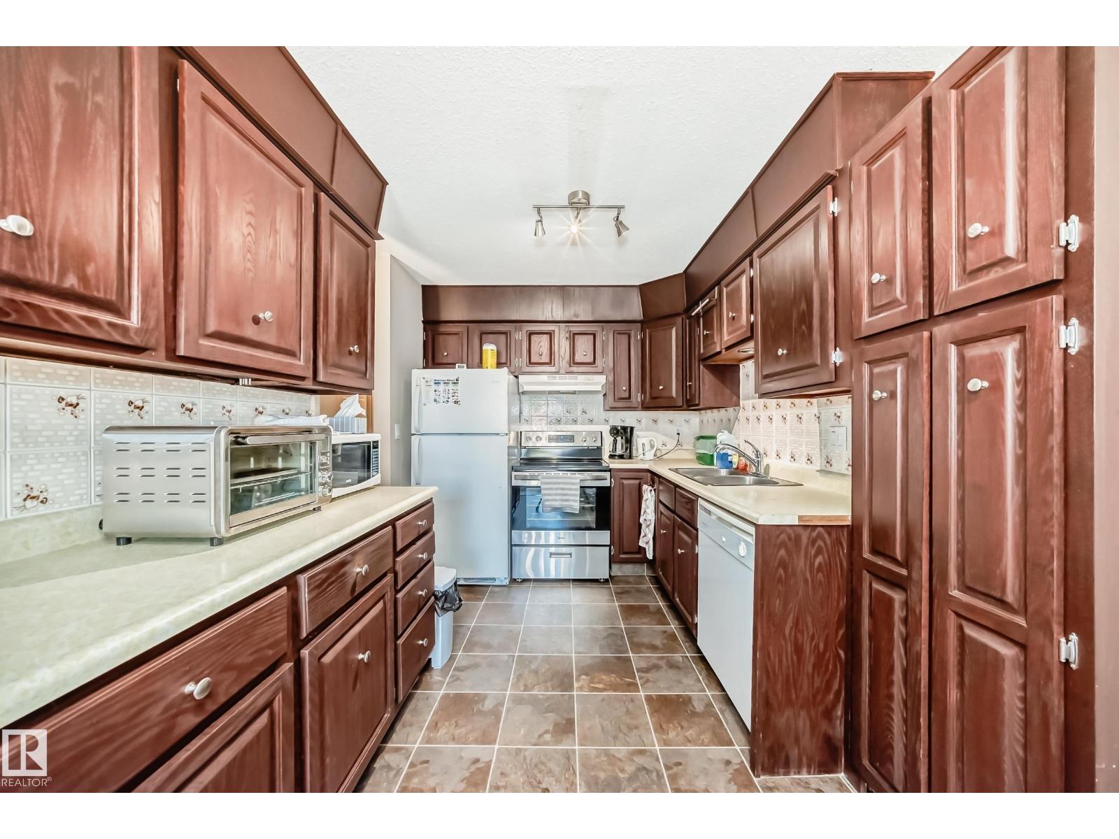 10614 Beaumaris Rd Nw, Edmonton, Alberta  T5X 3N4 - Photo 6 - E4457966