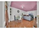 Dining space featuring light wood-type flooring and recessed lighting