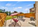 Fenced backyard featuring a patio area and outdoor dining area