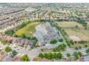 View of property location with nearby suburban area