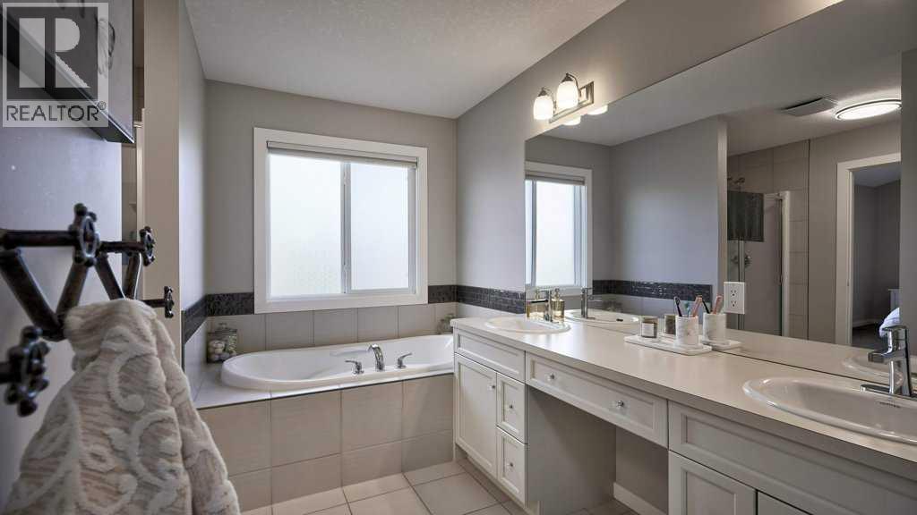 145 Kinniburgh Gardens, Chestermere, Alberta  T1X 0R7 - Photo 28 - A2253950