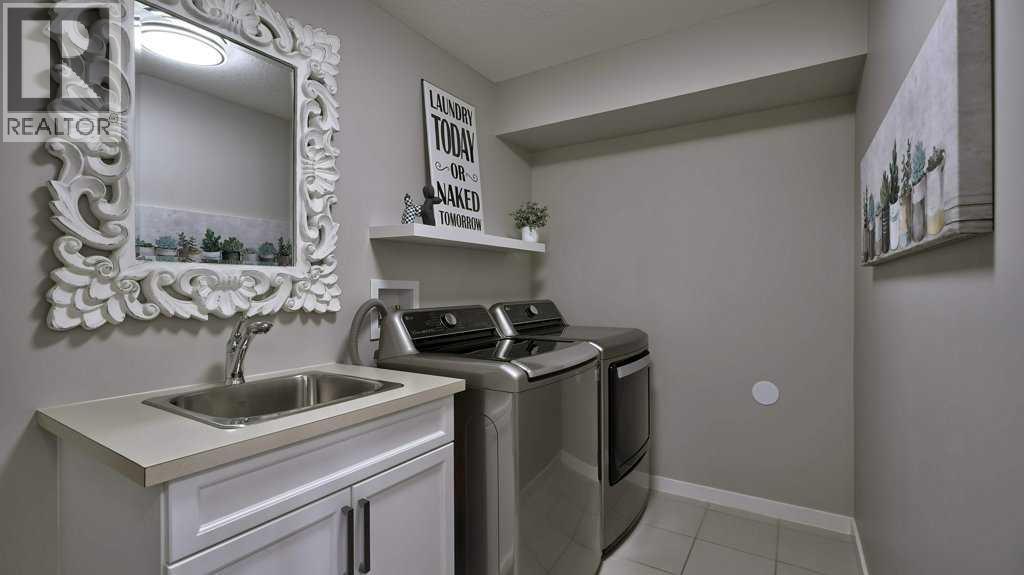 145 Kinniburgh Gardens, Chestermere, Alberta  T1X 0R7 - Photo 31 - A2253950