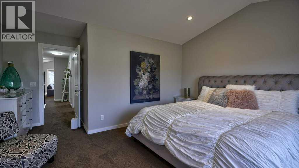 145 Kinniburgh Gardens, Chestermere, Alberta  T1X 0R7 - Photo 27 - A2253950