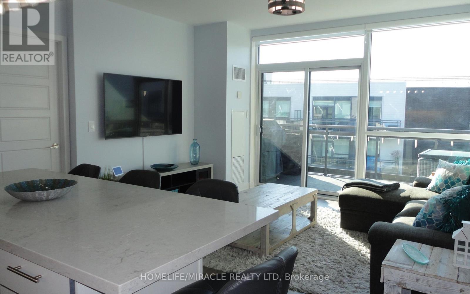 C410 - 301 Sea Ray Avenue, Innisfil, Ontario  L9S 2P7 - Photo 2 - N12407961