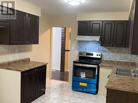36 Bruce Beer Drive, Brampton, Ontario  L6V 2W9 - Photo 6 - W12408068