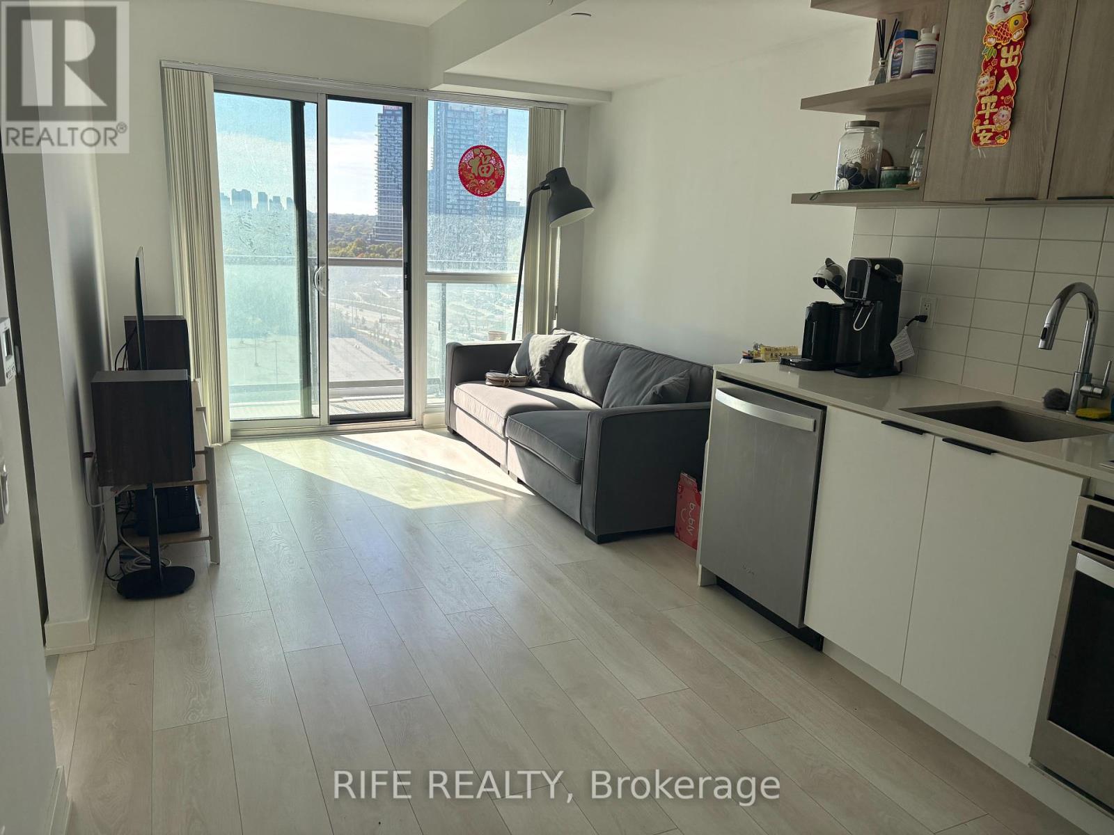 1410 - 6 Sonic Way, Toronto, Ontario  M3C 0P1 - Photo 2 - C12408340