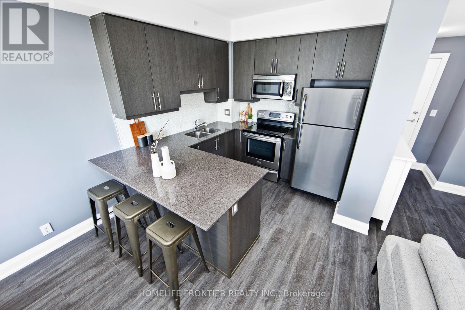 216 - 12 Woodstream Boulevard, Vaughan (Vaughan Grove), Ontario  L4L 8C3 - Photo 9 - N12405748