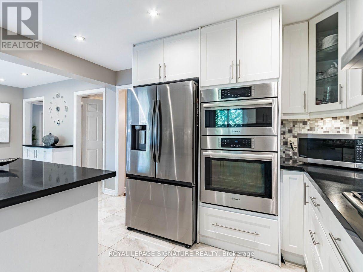 1206 Glenashton Drive, Oakville, Ontario  L6H 5L9 - Photo 11 - W12409101