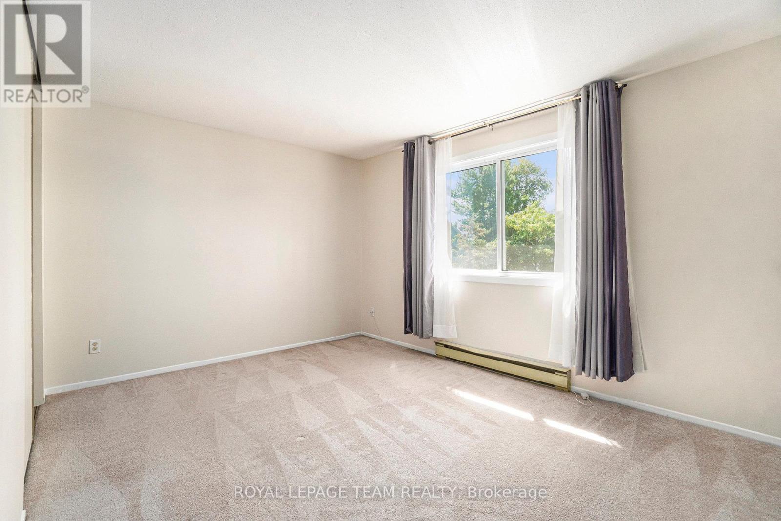 415 - 218 Viewmount Drive, Ottawa, Ontario  K2E 7X5 - Photo 12 - X12409306