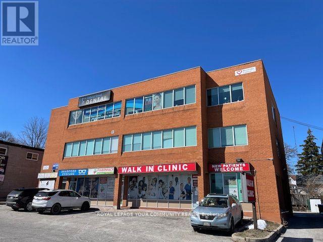 100 D - 107 Holland Street, Bradford West Gwillimbury, Ontario  L3Z 2B7 - Photo 1 - N12336547