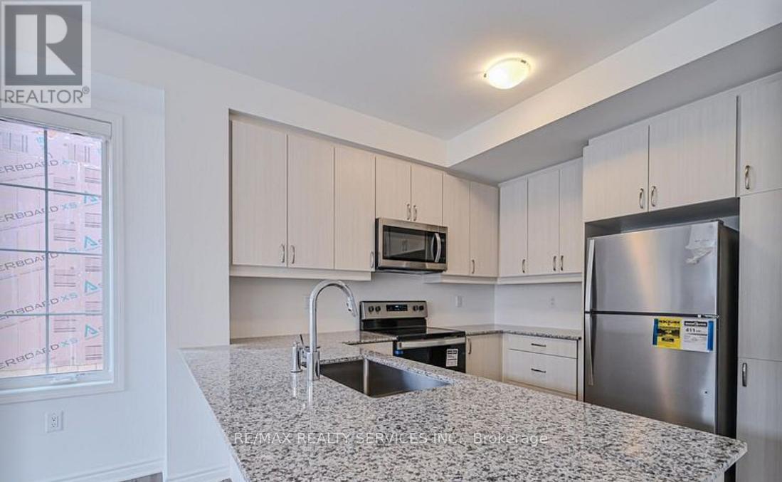 159 Keppel Circle, Brampton, Ontario  L7A 5K5 - Photo 5 - W12409165