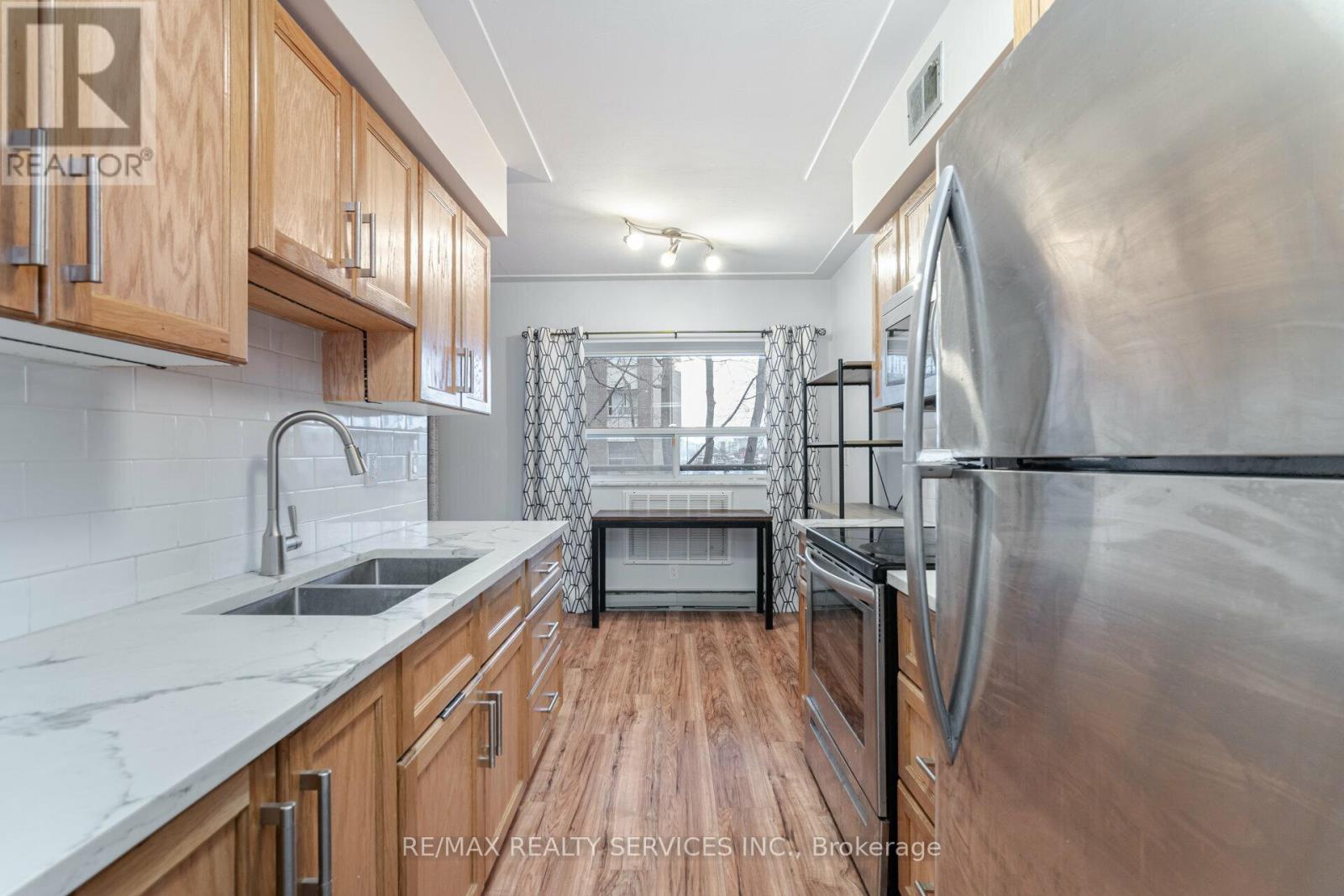 203 - 11 Woodman Drive S, Hamilton, Ontario  L8K 4E3 - Photo 18 - X12408143