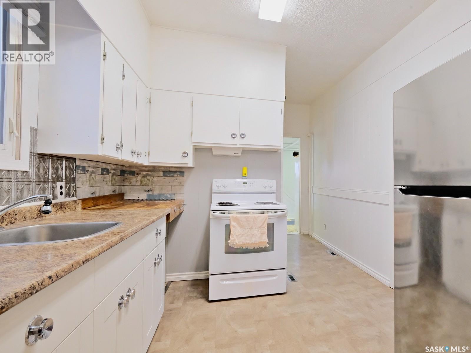 311 5th Avenue W, Biggar, Saskatchewan  S0K 0M0 - Photo 10 - SK018595