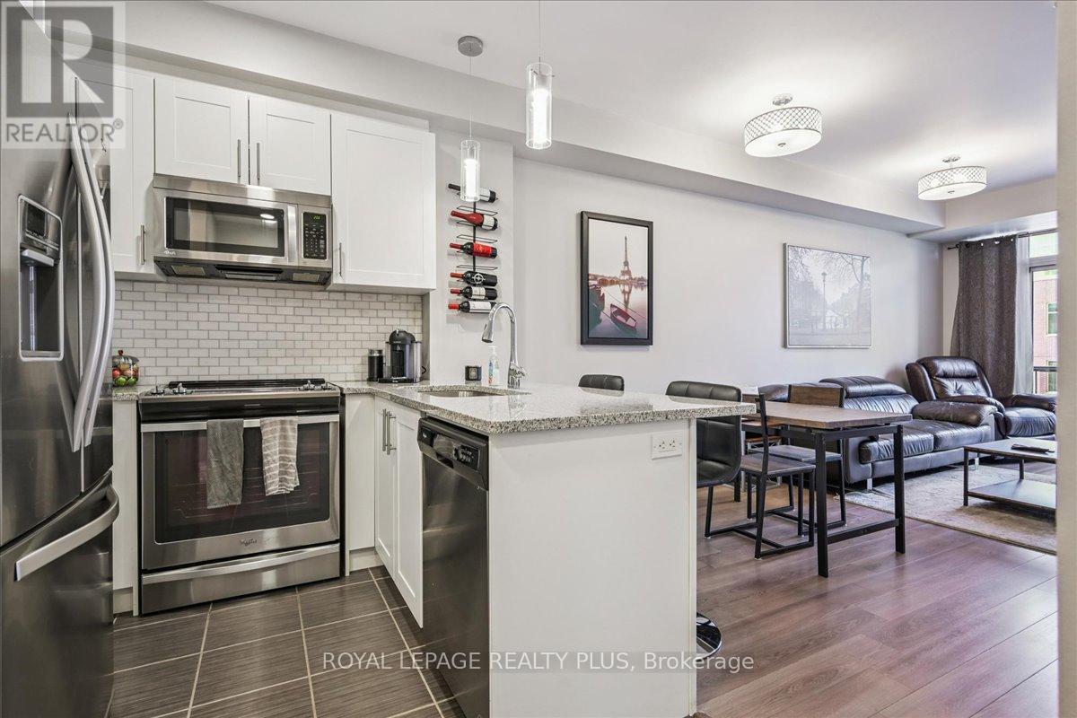 414 - 216 Oak Park Boulevard, Oakville (Ro River Oaks), Ontario  L6H 7S8 - Photo 9 - W12409911