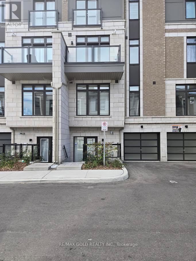 202 - 30 Halliford Place, Brampton, Ontario  L4P 4R1 - Photo 1 - W12410694