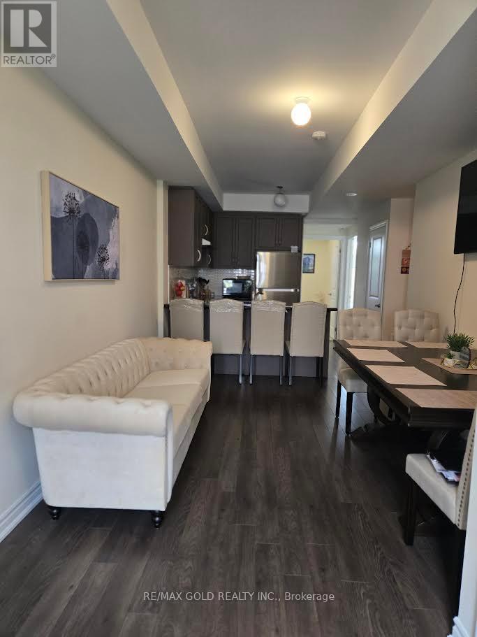 202 - 30 Halliford Place, Brampton, Ontario  L4P 4R1 - Photo 3 - W12410694