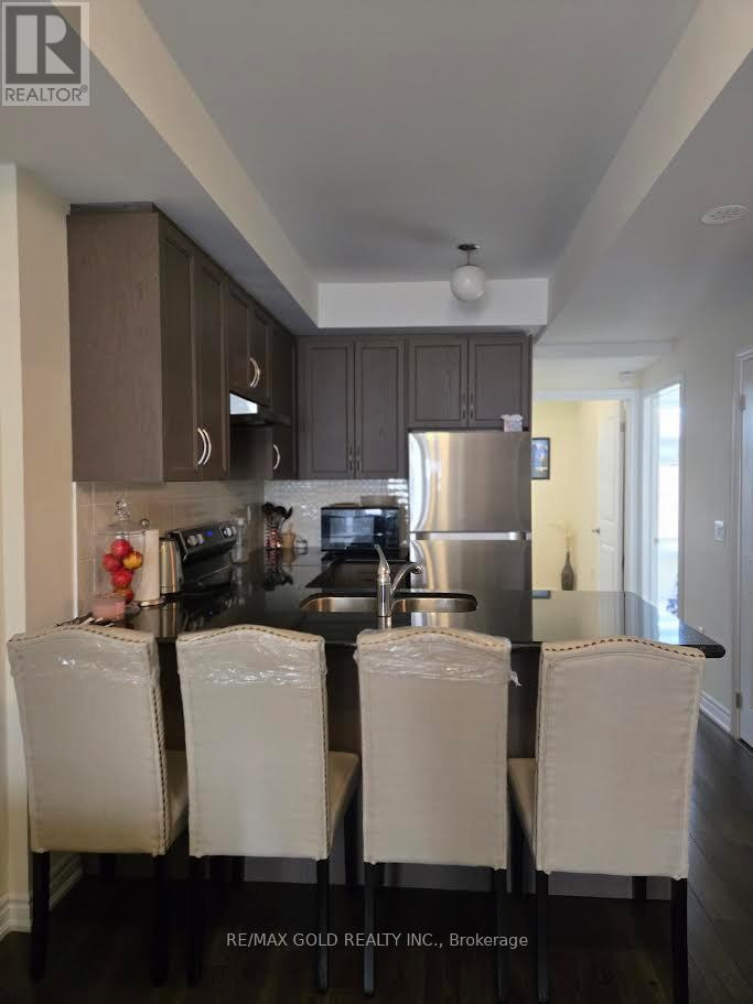 202 - 30 Halliford Place, Brampton, Ontario  L4P 4R1 - Photo 5 - W12410694