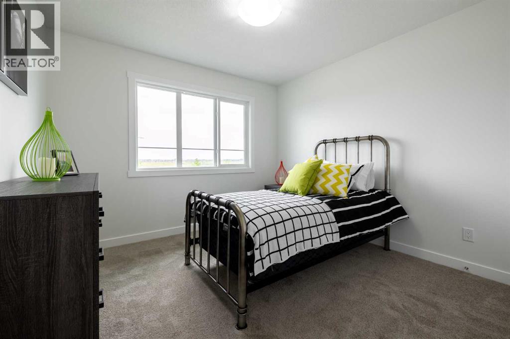 71 Heritage Manor, Cochrane, Alberta  T4C 3K7 - Photo 20 - A2233705