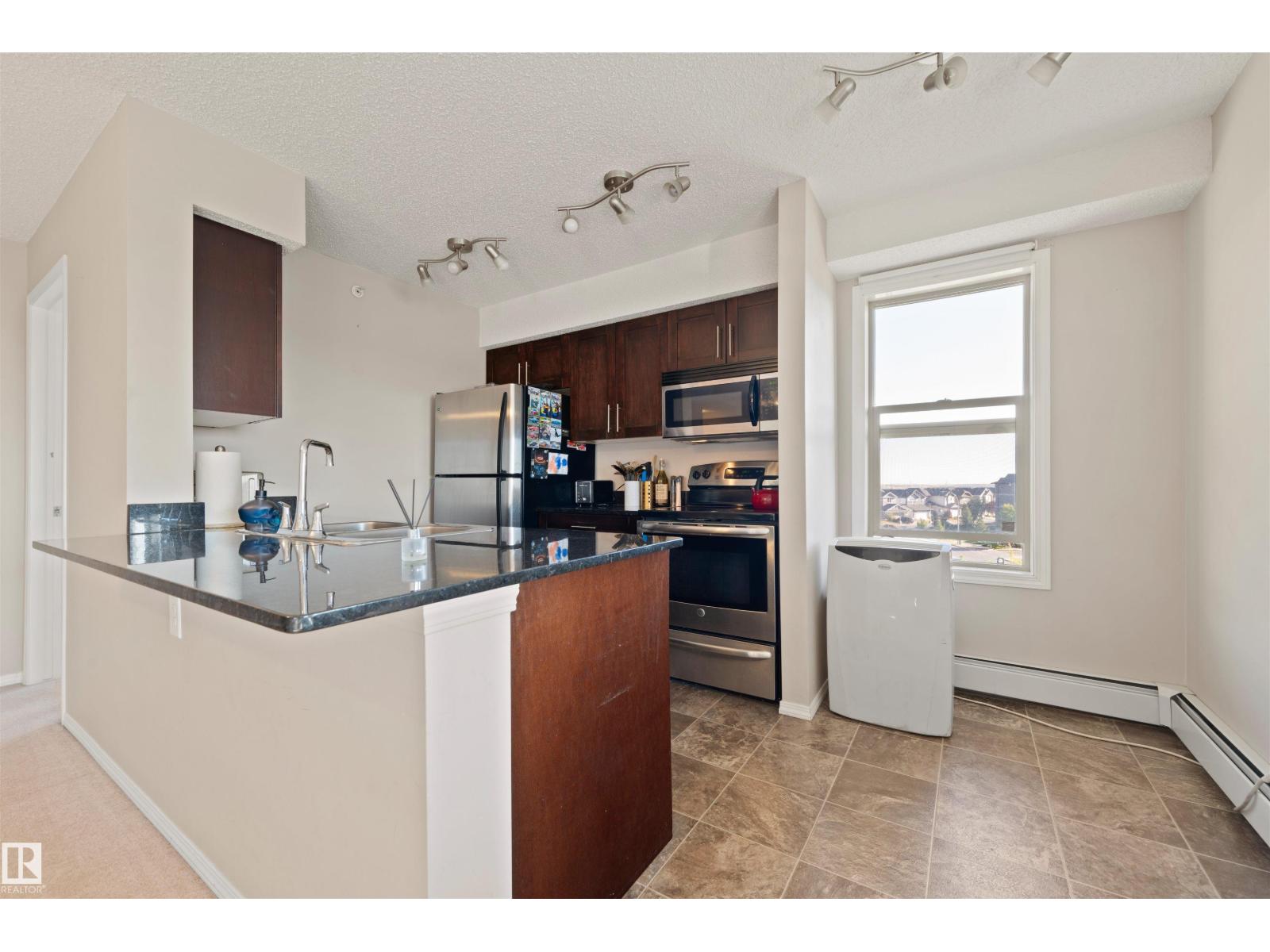 #402 1080 Mcconachie Blvd Nw, Edmonton, Alberta  T5Y 0X2 - Photo 6 - E4458215