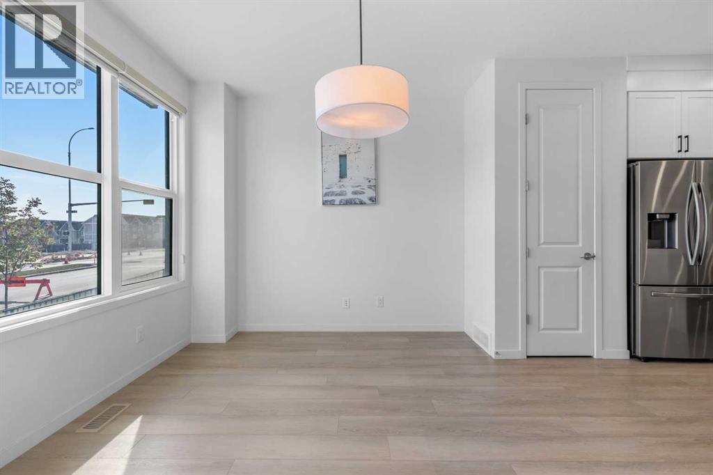 21 Edith Gate Nw, Calgary, Alberta  T3R 1Z3 - Photo 6 - A2257638