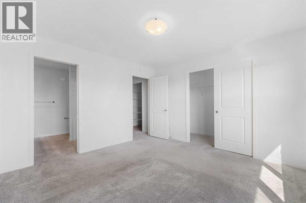 21 Edith Gate Nw, Calgary, Alberta  T3R 1Z3 - Photo 29 - A2257638