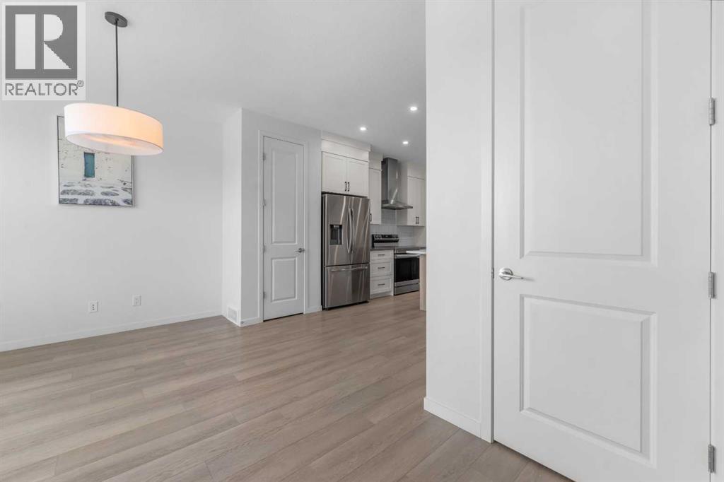 21 Edith Gate Nw, Calgary, Alberta  T3R 1Z3 - Photo 5 - A2257638