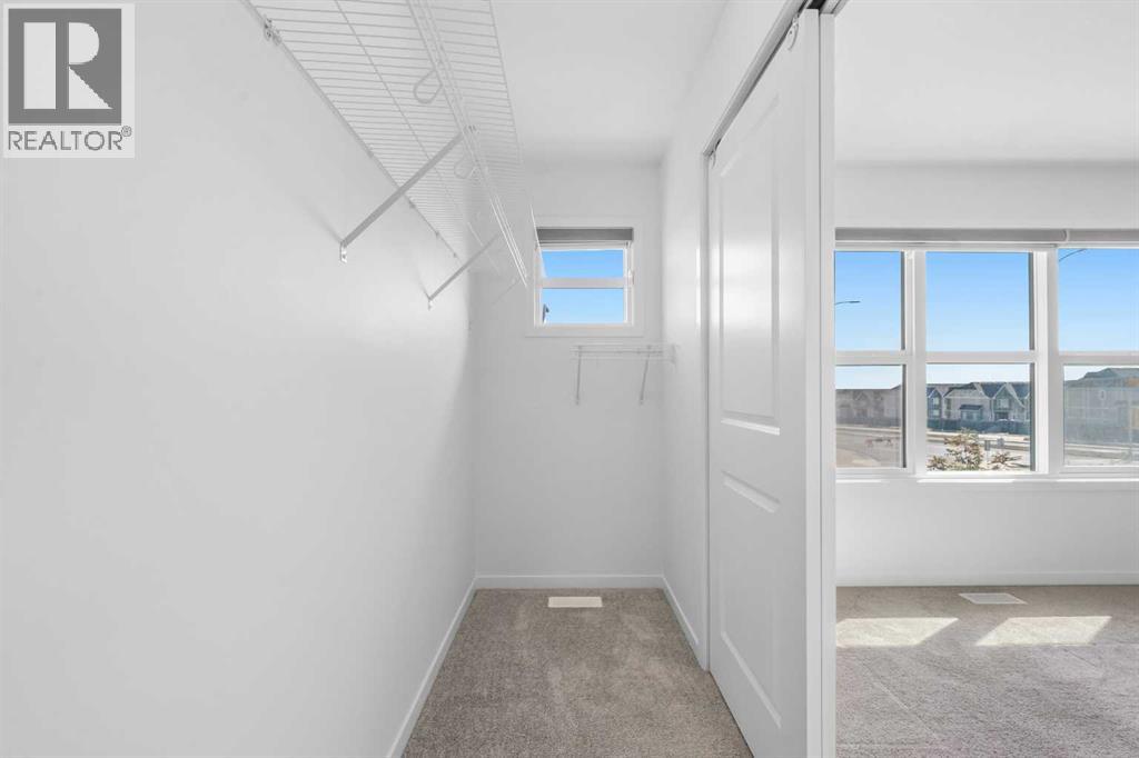 21 Edith Gate Nw, Calgary, Alberta  T3R 1Z3 - Photo 31 - A2257638