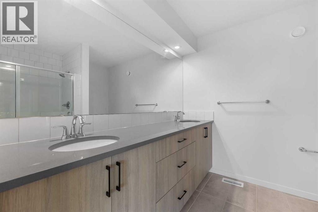21 Edith Gate Nw, Calgary, Alberta  T3R 1Z3 - Photo 33 - A2257638