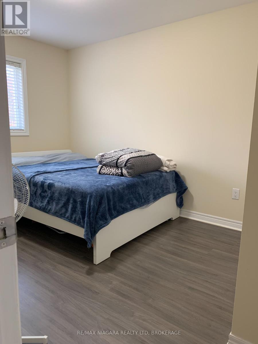 12 Haney Drive, Thorold, Ontario  L2V 0G4 - Photo 11 - X12411028