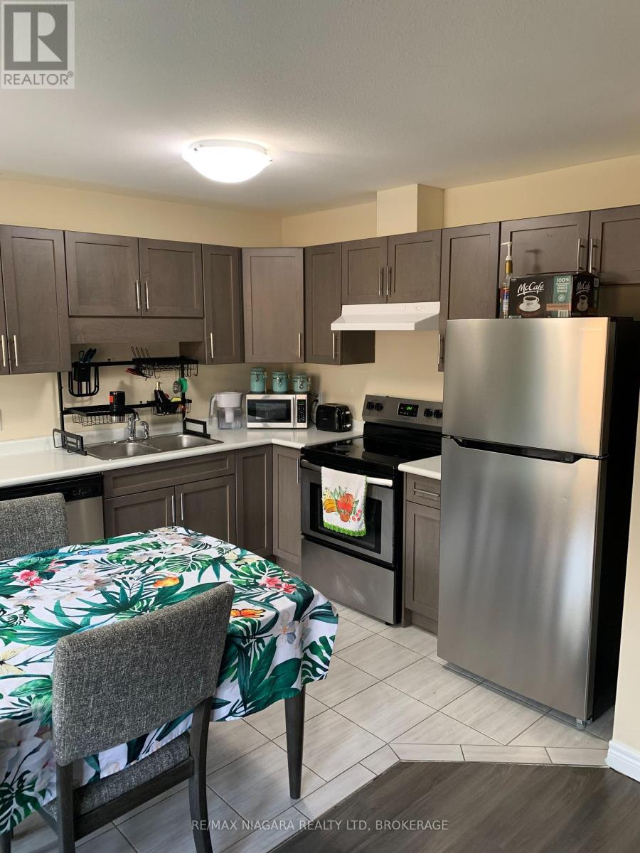 12 Haney Drive, Thorold, Ontario  L2V 0G4 - Photo 4 - X12411028