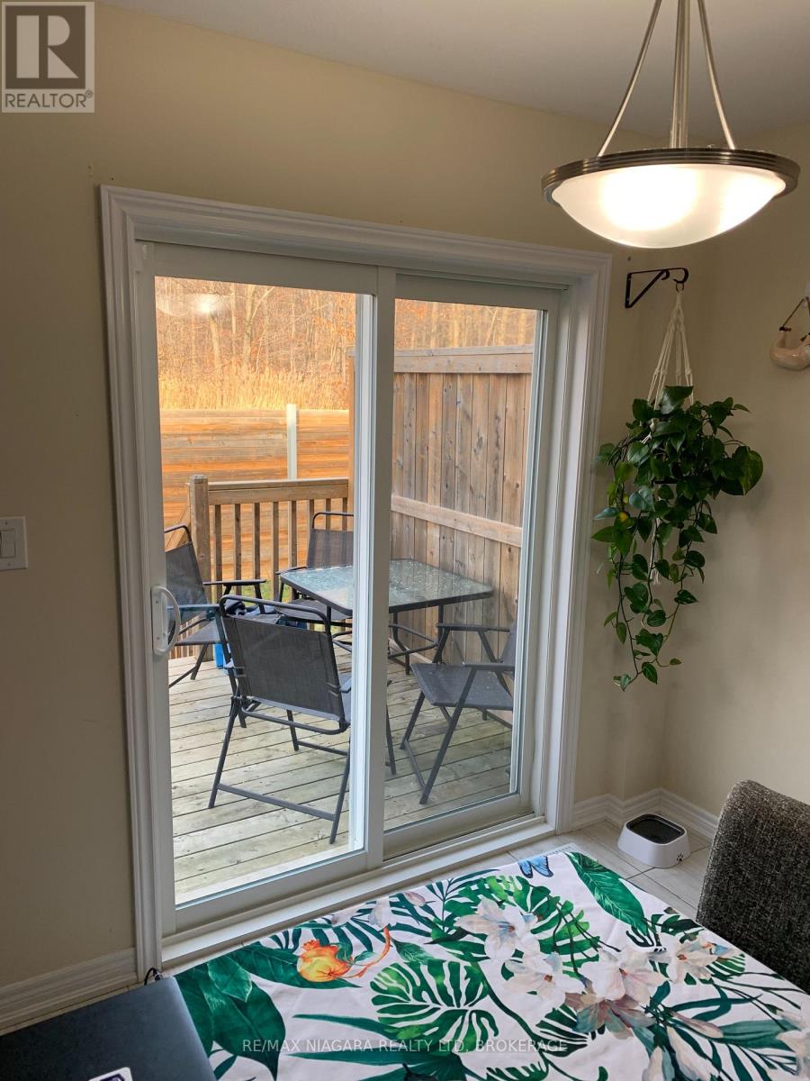 12 Haney Drive, Thorold, Ontario  L2V 0G4 - Photo 5 - X12411028