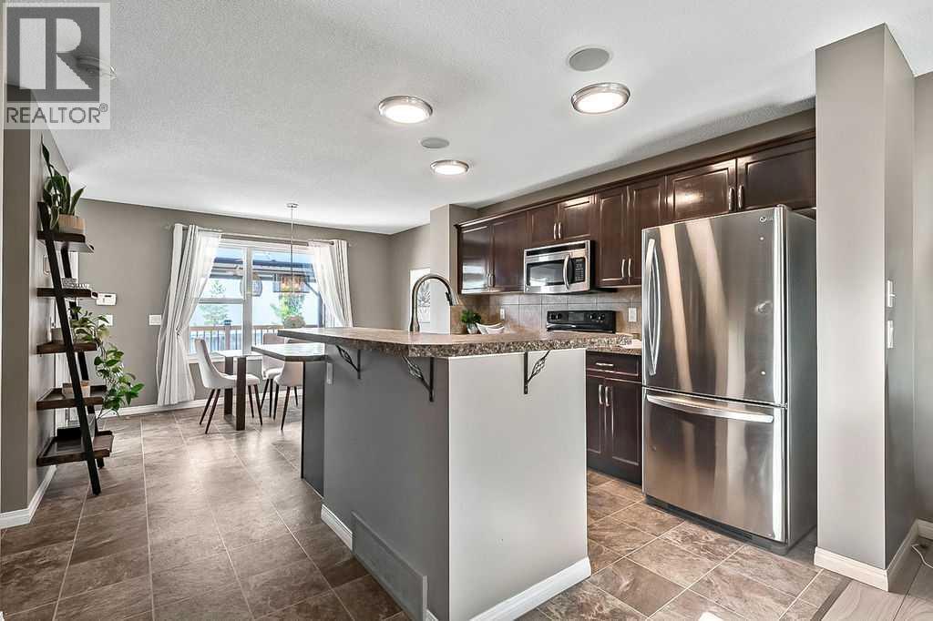 91 Cimarron Grove Close, Okotoks, Alberta  T1S 0H5 - Photo 7 - A2256938
