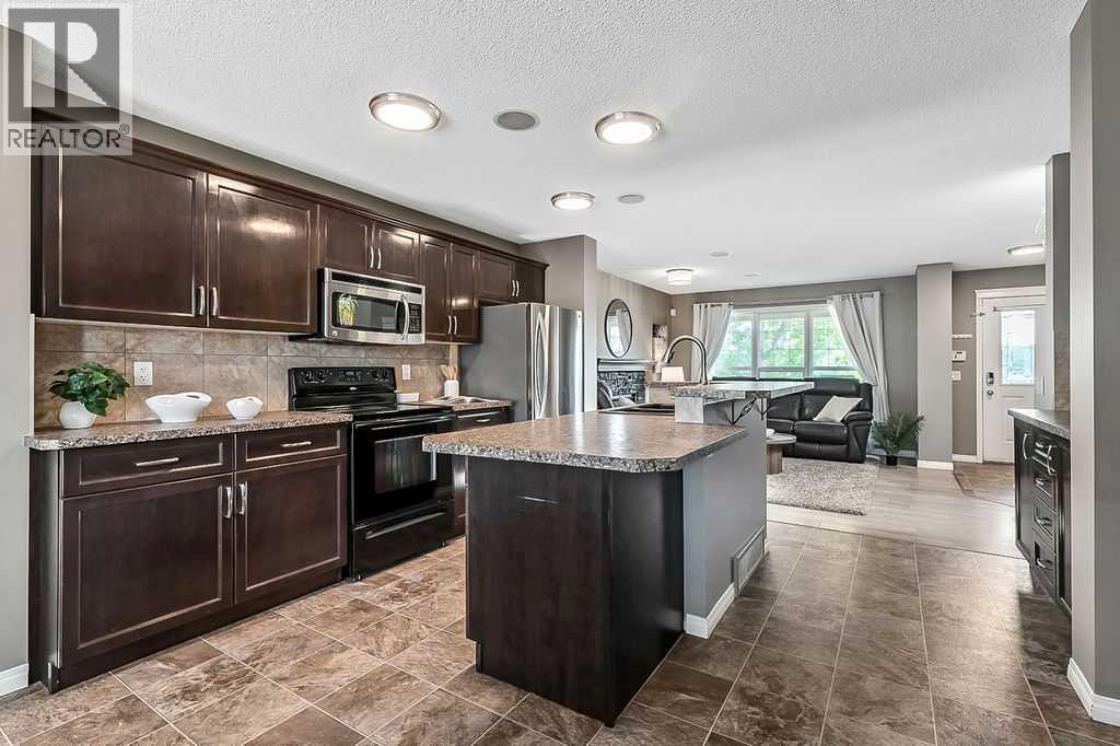 91 Cimarron Grove Close, Okotoks, Alberta  T1S 0H5 - Photo 8 - A2256938