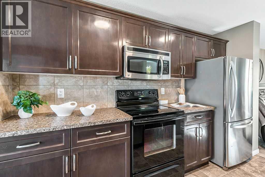 91 Cimarron Grove Close, Okotoks, Alberta  T1S 0H5 - Photo 9 - A2256938