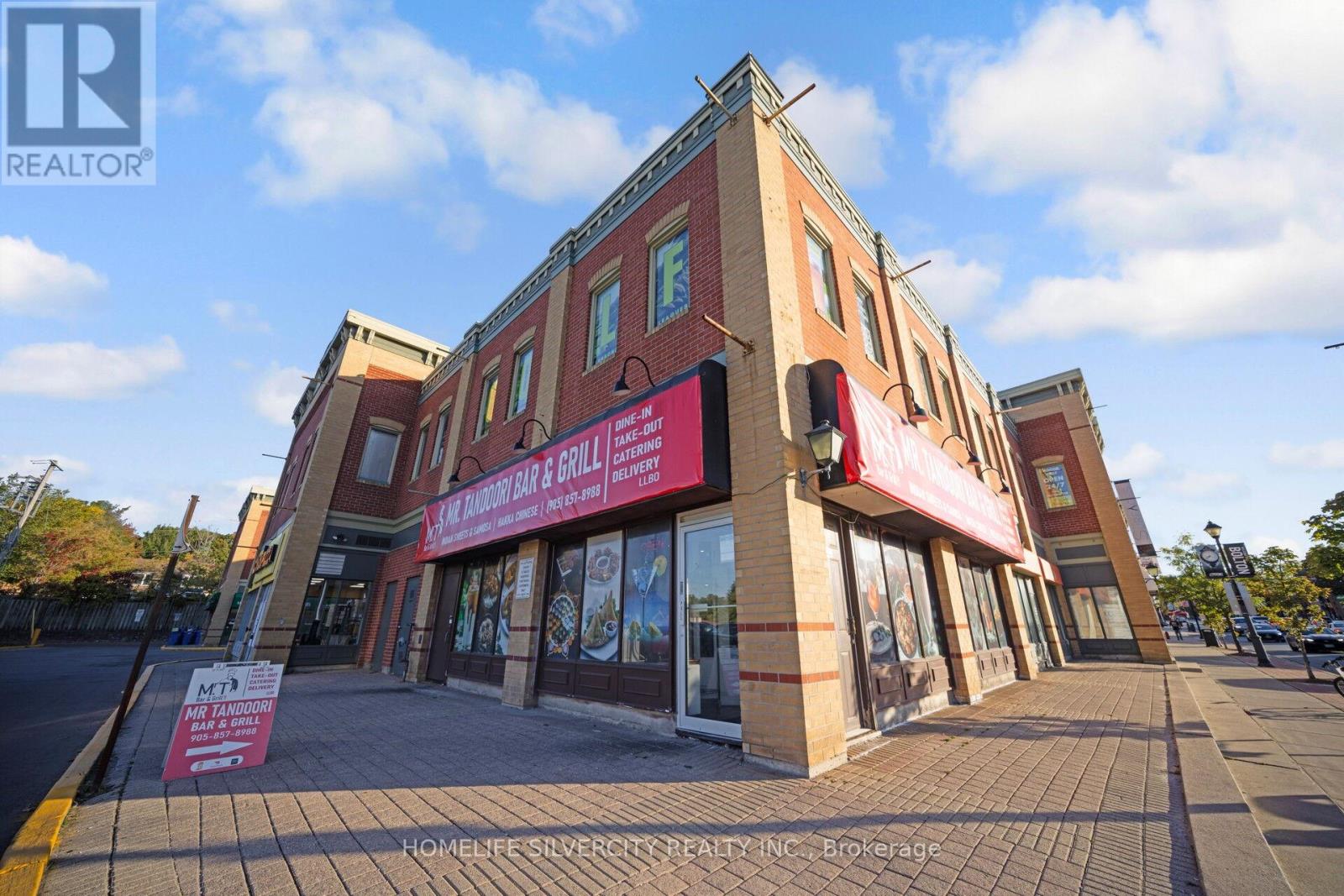 15 - 18 King Street E, Caledon (Bolton North), Ontario  L7E 1E8 - Photo 1 - W12411214
