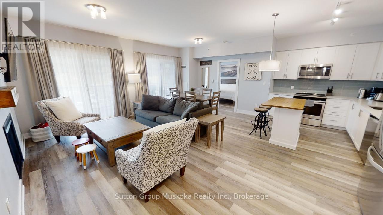 318 - 25 Pen Lake Point Road, Huntsville (Chaffey), Ontario  P1H 2E8 - Photo 2 - X12411563