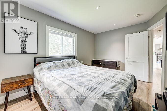 2309 Taylorwoods Boulevard, Innisfil, Ontario  L9S 2E7 - Photo 19 - N12411435