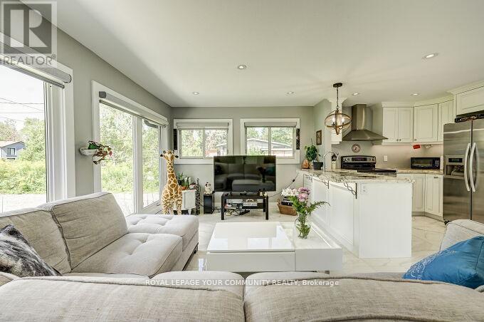 2309 Taylorwoods Boulevard, Innisfil, Ontario  L9S 2E7 - Photo 6 - N12411435