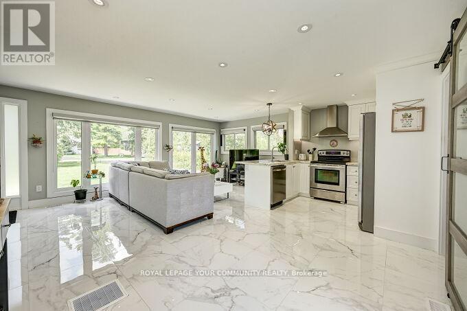 2309 Taylorwoods Boulevard, Innisfil, Ontario  L9S 2E7 - Photo 8 - N12411435